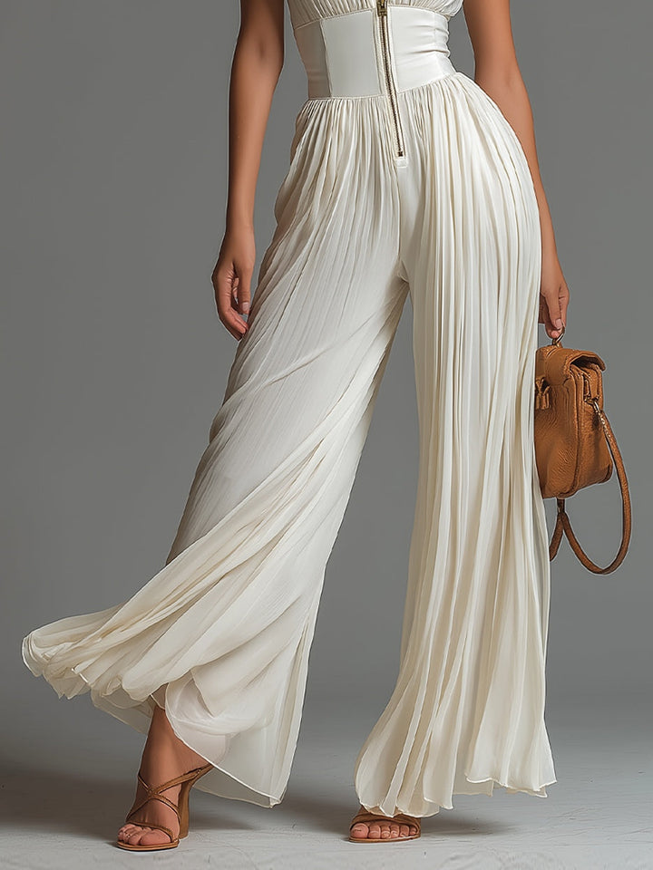 White Chiffon V-Neck Sleeveless Jumpsuit with Zipper Closure, Pleated Details, and Wide-Leg Design