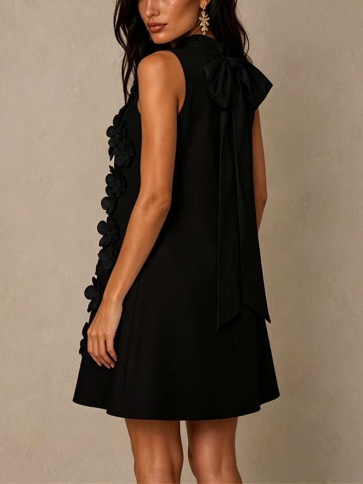 Black Sleeveless Mini Dress Featuring Striking Floral And Bow Details
