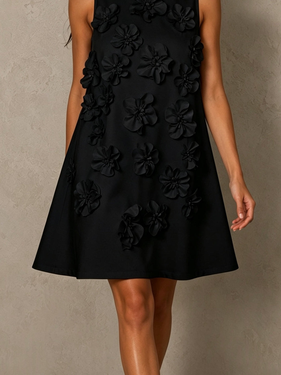 Black Sleeveless Mini Dress Featuring Striking Floral And Bow Details